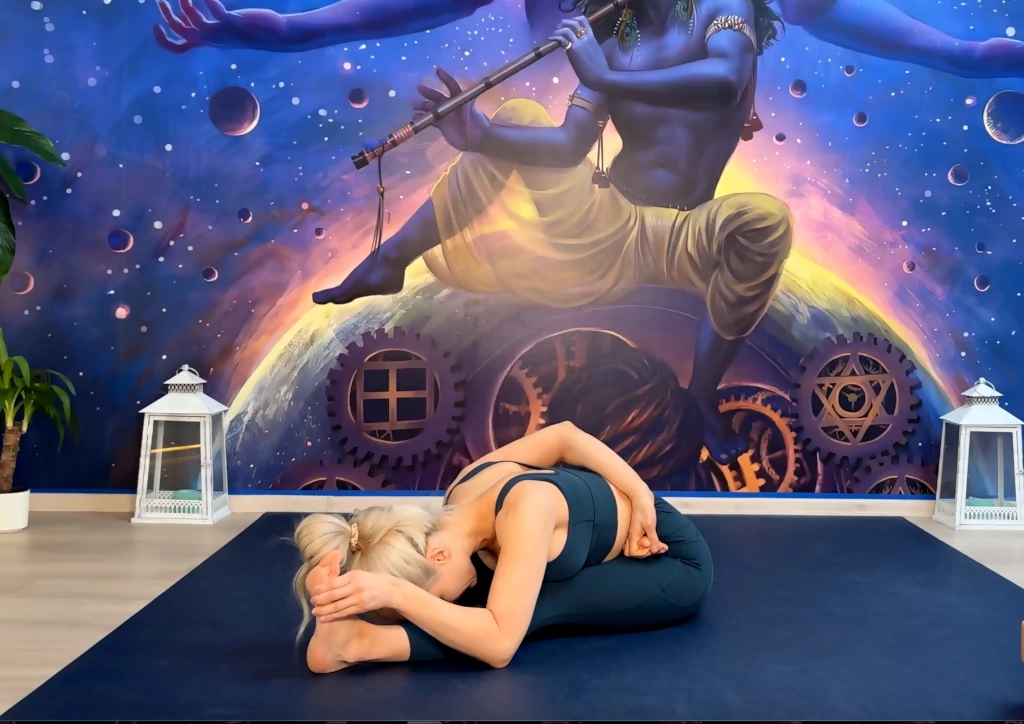 Ardha Baddha Padma Paschimottanasana